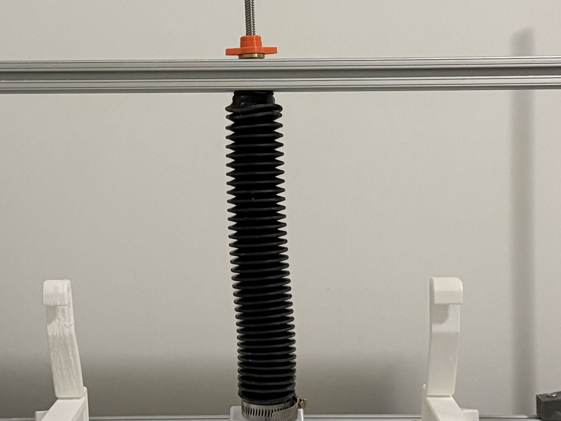 Printed TPU bellows segments bonded into the full-length cover